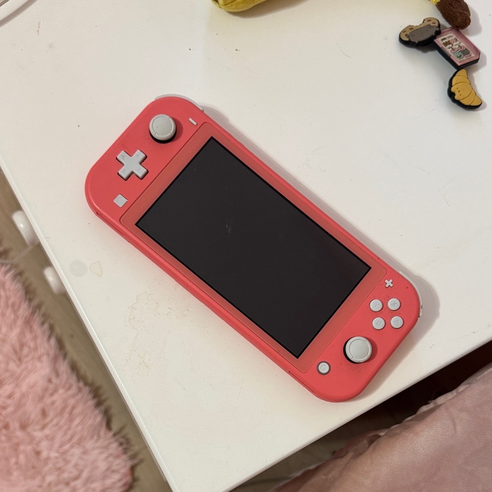 Nintendo Coral Handheld switch lite pink animal crossing
